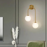 Brass Wall Lighting with Double Globe Design